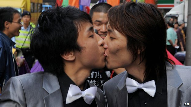 File photo: Rally participants take part in a gay and lesbian rally through the streets in Hong Kong on 13 December 2008
